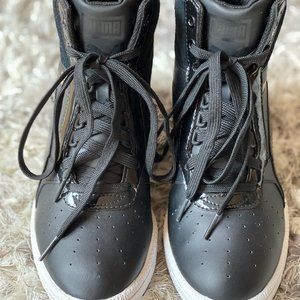 PUMA black wedge high top sneakers